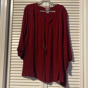 Burgundy blouse. Gold accents